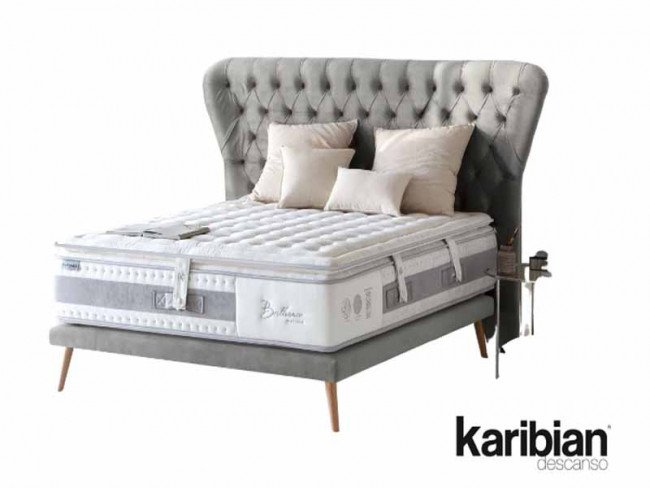 COLCHON BRILLIANCE + TOPPER 180X200 CM KARIBIAN DESCANSO. El colchón Brilliance de Karibian Descanso es un modelo de alta gama que combina lujo y tecnología avanzada para proporcionar un descanso reparador. Este colchón pertenece a la categoría de muelles ensacados y cuenta con una altura de 35 cm. Incorpora fibras naturales como lino y seda, que ofrecen una excelente transpirabilidad y una sensación de frescor durante el sueño. Además, su núcleo de muelles ensacados proporciona una adaptabilidad óptima al cuerpo, asegurando una correcta alineación de la columna vertebral. La capa de viscoelástica de alta densidad se adapta a la forma del cuerpo, aliviando los puntos de presión y mejorando la calidad del descanso. Para complementar las prestaciones del colchón Brilliance, Karibian ofrece toppers diseñados para mejorar aún más el confort y la adaptabilidad. Estos toppers están fabricados con materiales de alta calidad, como viscoelástica y gel, que proporcionan una sensación de acogida y frescor adicional. Al colocar un topper sobre el colchón, se incrementa la sensación de suavidad y se prolonga la vida útil del mismo, ya que actúa como una capa protectora adicional. Características del colchón: Altura: 35 cm Núcleo: Muelles ensacados Capas de confort: Fibras naturales: Lino y seda Viscoelástica: Alta densidad Funda: Tejido de alta transpirabilidad Firmeza: Media Transpirabilidad: Alta Adaptabilidad: Excelente Confort: Óptimo El producto se servirá con las características técnicas y complementos descritos por el fabricante, la imagen puede variar con respecto al producto final entregado.